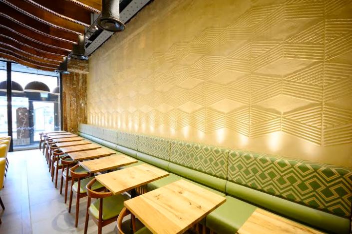 Anaglyptic clay finish, Nando's restaurant in Manchester, photographer Helene Collie van de Langenberg