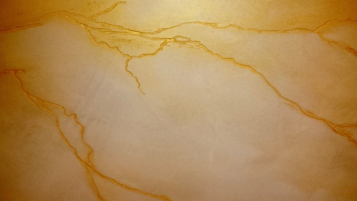 Carved clay wall by Guy Valentine