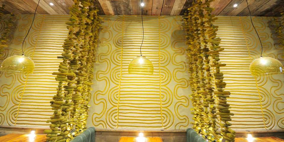 Carved clay finish, Nando's restaurant in Redditch, photographer James Parsons