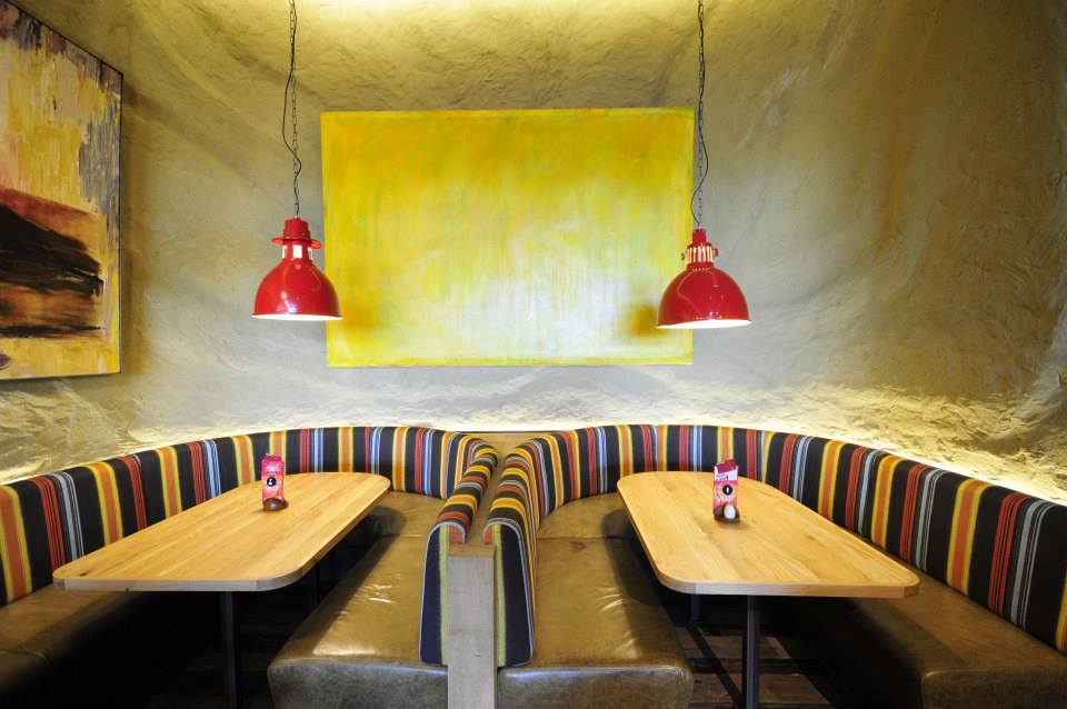 Undulated clay finish, Nando's restaurant in Bristol
