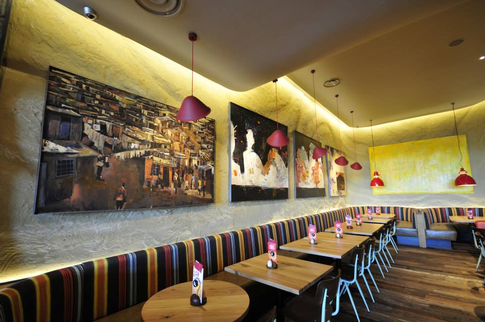 Undulated clay finish, Nando's restaurant in Bristol