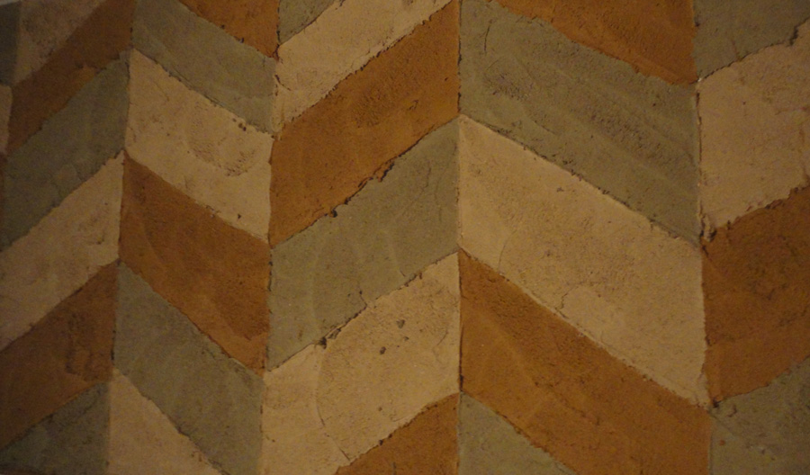 Carved clay wall, multiple colours bottom coat, geometric pattern, Nando's restaurant in Hamilton
