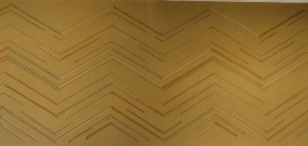 Carved clay wall, multiple colours, geometric pattern, Nando's restaurant in Hamilton