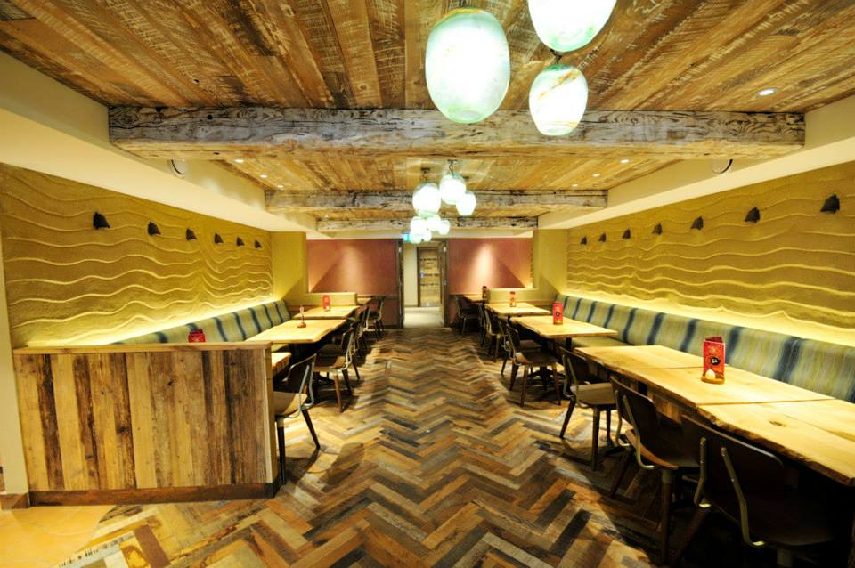 Undulated clay finish, Nando's restaurant in Dublin, Ireland