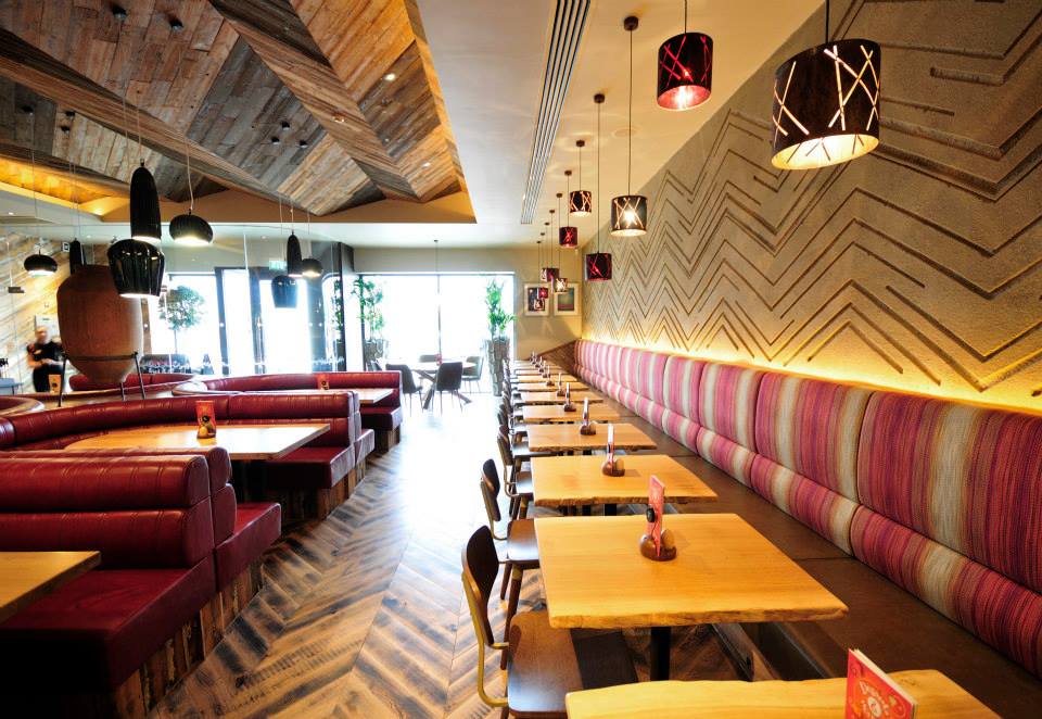 Carved clay wall, multiple colours, geometric pattern, Nando's restaurant in Hamilton