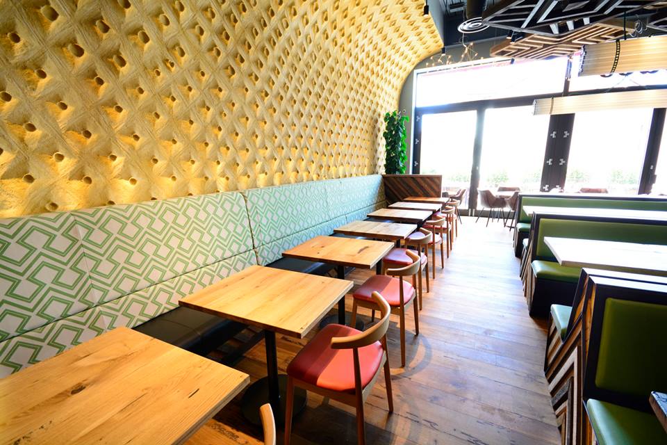 Embossed clay wall, Nando's restaurant in Hereford