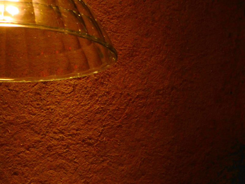 Rough and rustic textured clay finish, Nando's restaurant in High Street Kensington, London