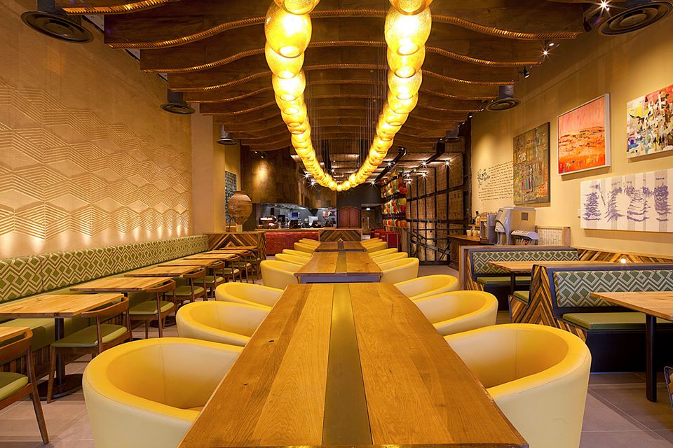 Embossed clay wall by Guy Valentine, photographer Helene Collie van de Langenberg