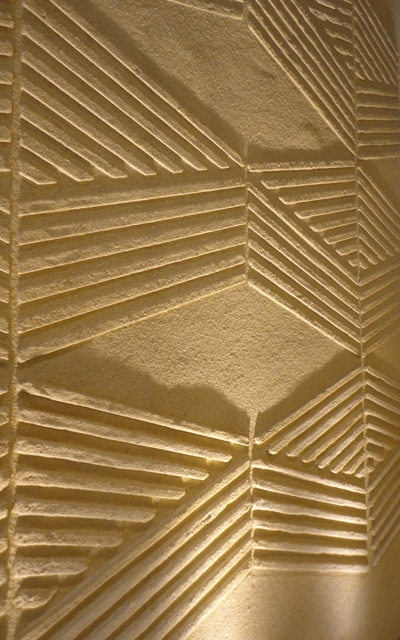 Anaglyptic clay textured wall, Nando's restaurant in Manchester