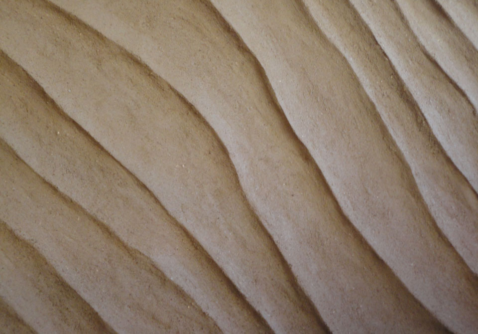 Embossed clay wall, Nando's restaurant in Newcastle