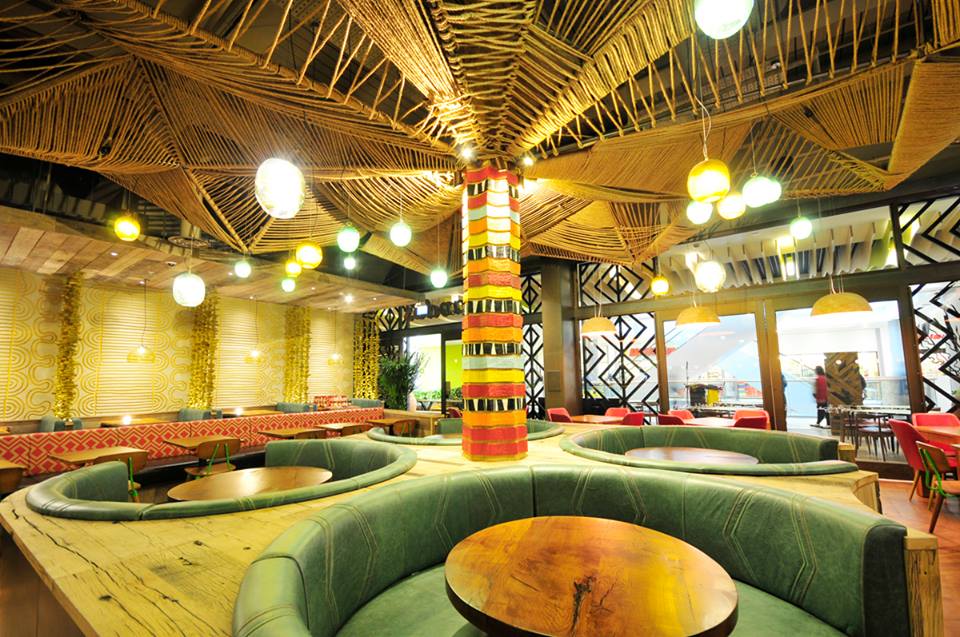 Carved clay wall, Nando's restaurant in Redditch, photographer James Parsons