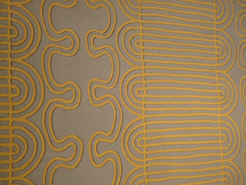 Carved clay wall, African inspired pattern, Nando's restaurant in Redditch