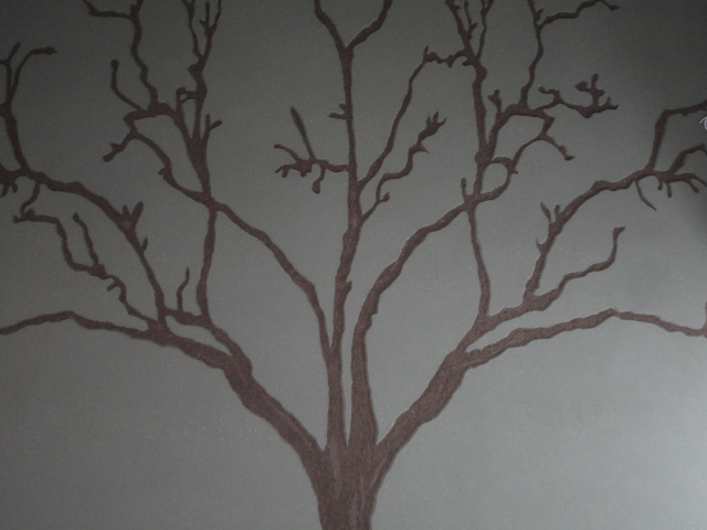 Carved clay wall by Guy Valentine