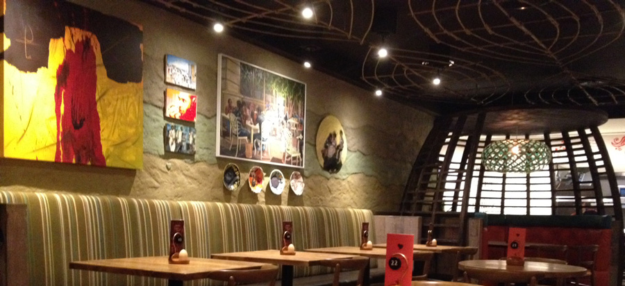 Rammed earth clay finish, Nando's Restaurant in Al Qasba, Dubai, UAE