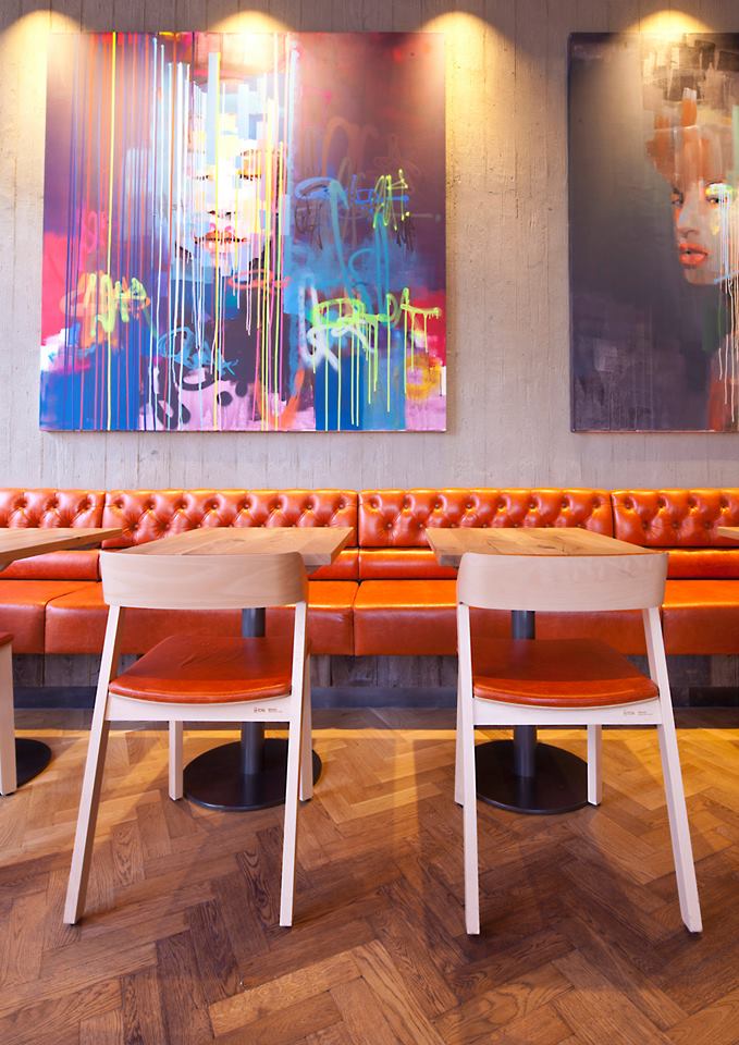 Board-marked shuttering clay finish, Nando's restaurant in Telford